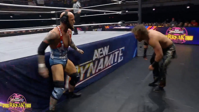 Alexander and Page brawling on the outside