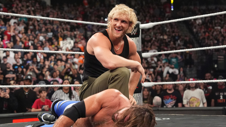 Logan Paul celebrates after attacking AJ Styles during Monday Night RAW at Golden 1 Center on April 14, 2025 in Sacramento, California.