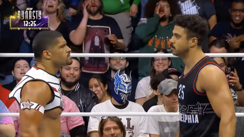 Bowens and Caster staring each other down in the ring