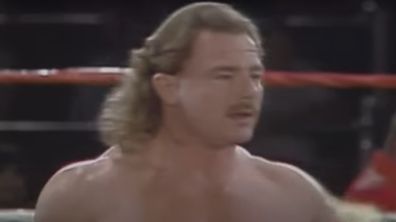 B. Brian Blair standing in the ring. 