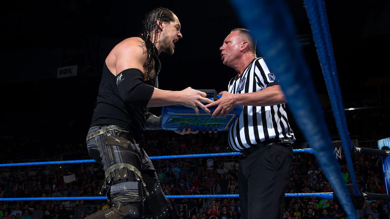Baron Corbin cashing in money in the bank
