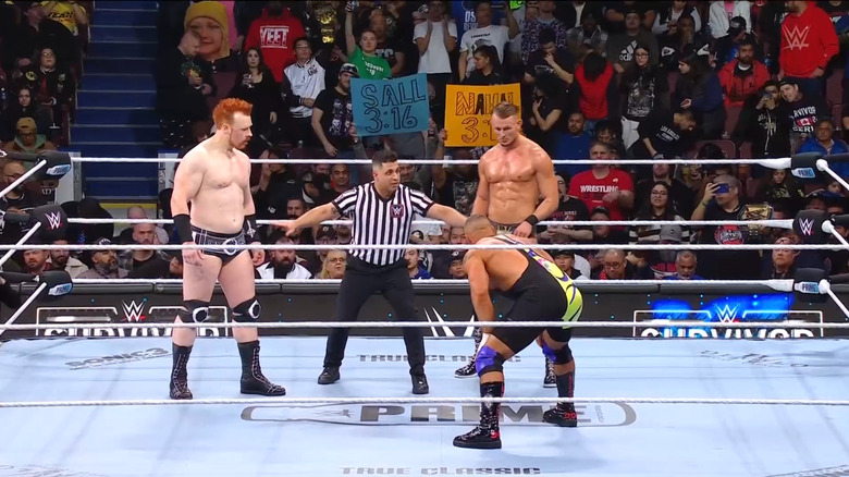 The three men inside the ring