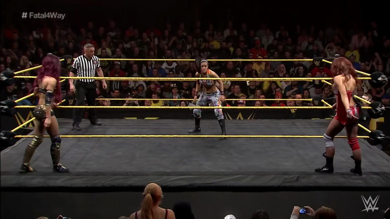 Sasha Banks and Becky Lynch have Bayley surrounded