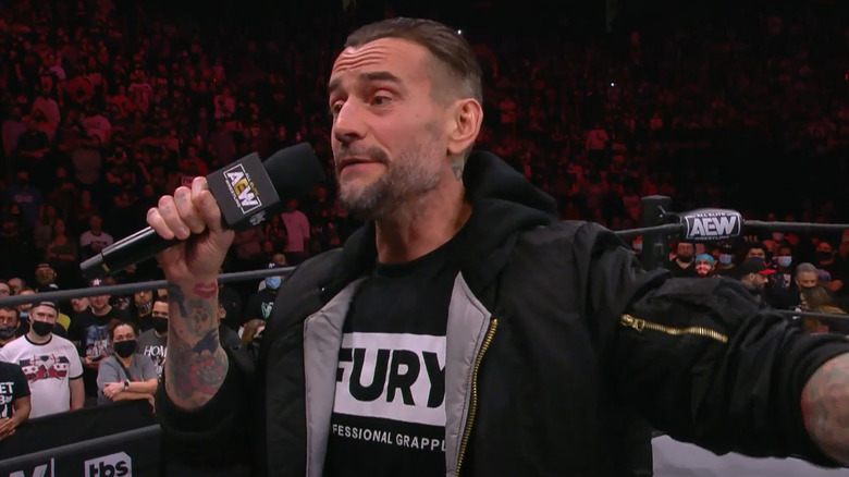 CM Punk exchanges words with MJF