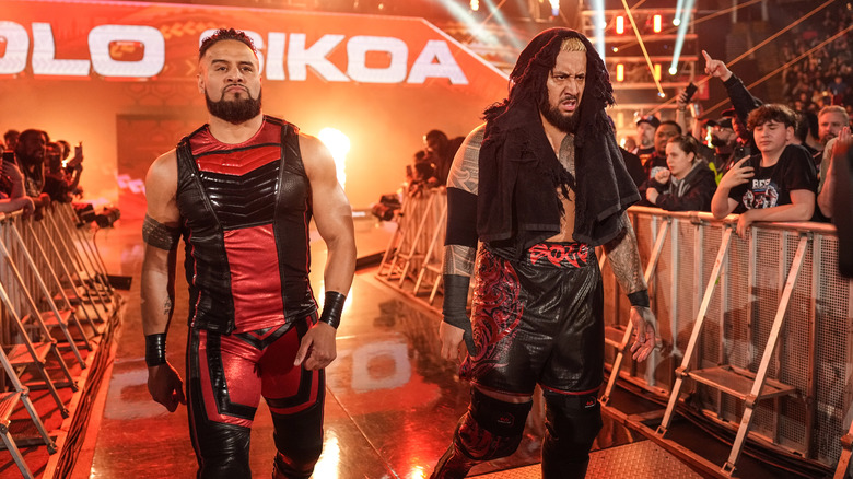 Solo Sikoa and Tama Tonga make their entrance