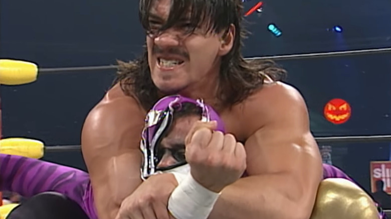Eddie Guerrero grabs Rey Mysterio