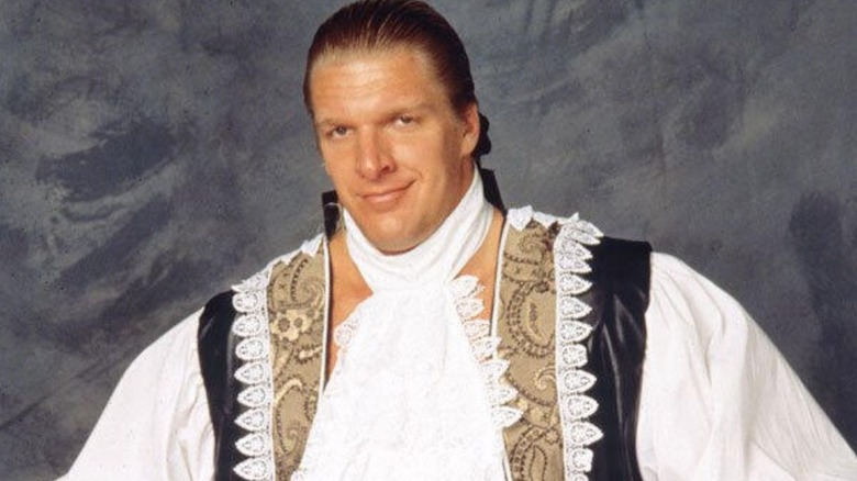 Paul Levesque, the future Triple H, poses backstage in his Jean-Paul Levesque gimmick.