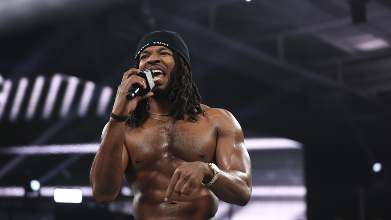 Trick Williams with a mic