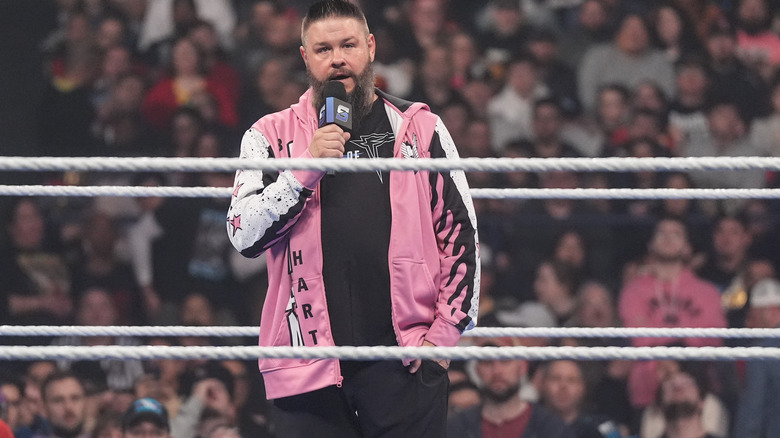 Kevin Owens speaks into microphone in the ring on "WWE SmackDown."