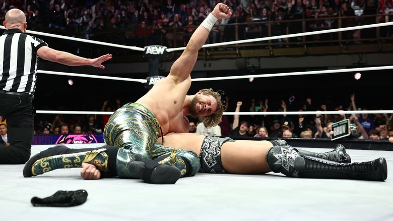 WIll Ospreay raises his arm after pinning Konosuke Takeshita on "AEW Dynamite"