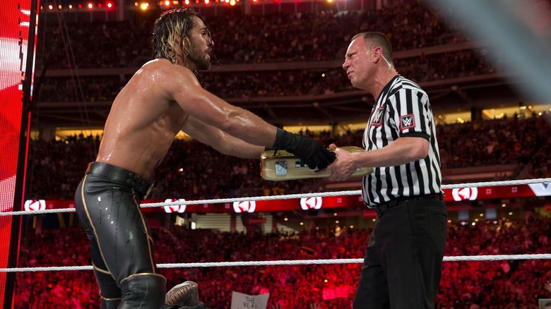 Seth Rollins cashing in Money in the Bank at WWE WrestleMania 31
