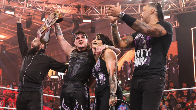 Dominik Mysterio celebrates with The Judgment Day