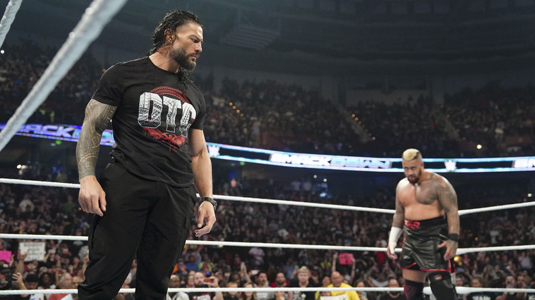 Roman Reigns and Solo Sikoa stare each other down in WWE ring