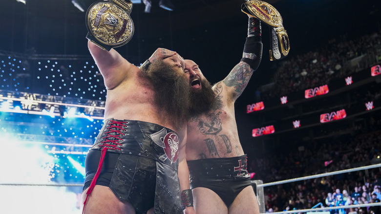 War Raiders hold up their newly-won WWE World Tag Team Championship on "WWE Raw"