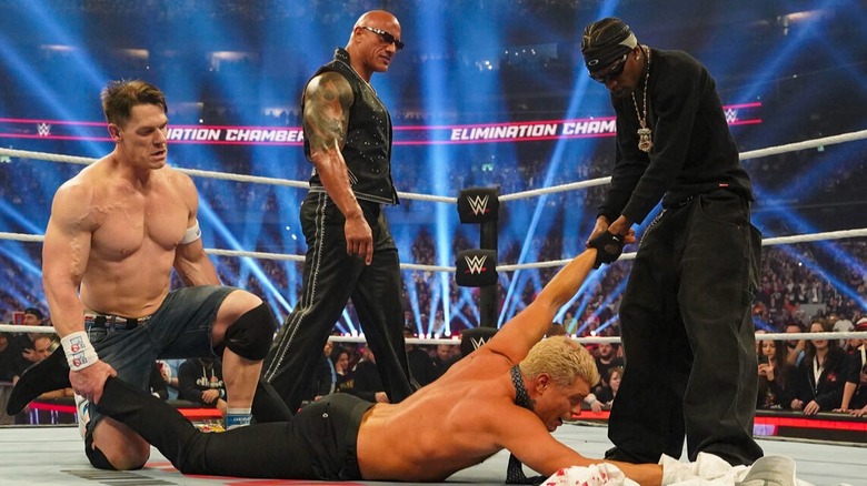The Rock, John Cena, and rapper Travis Scott all brutalize Cody Rhodes after the "American Nightmare" rejects The Rock's offer.