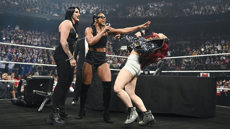 Ripley, Belair, and SKY in the ring