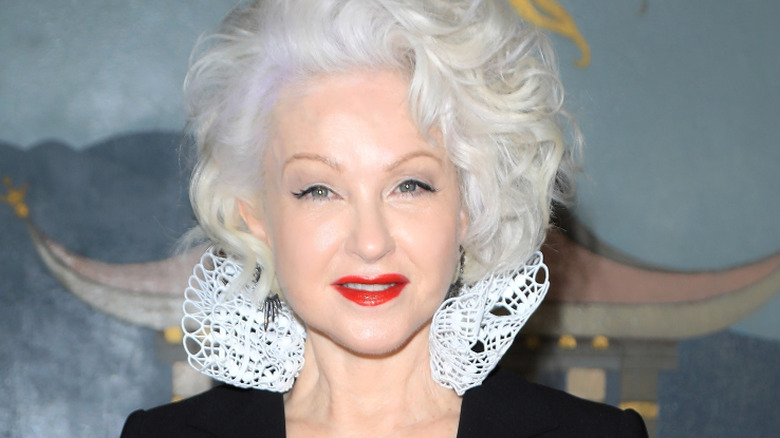 cyndi lauper posing on red carpet
