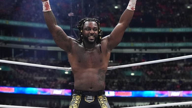 Swerve Strickland raises his arms in the air at AEW All In 2024