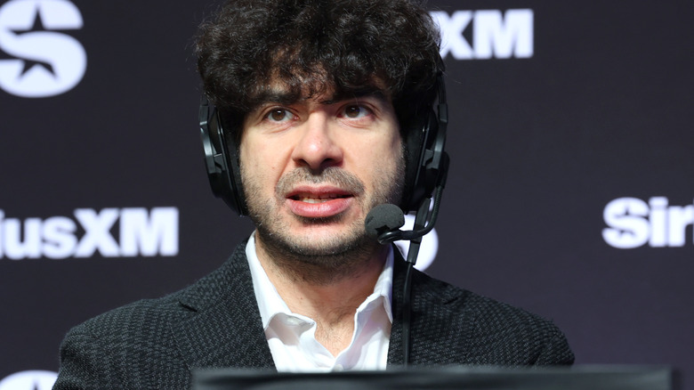 Tony Khan wearing headset