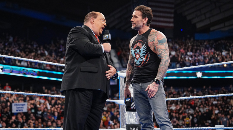 CM Punk and Paul Heyman during "WWE SmackDown"
