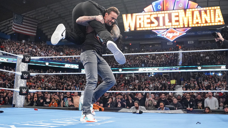 CM Punk hits GTS on Roman Reigns in the ring on 