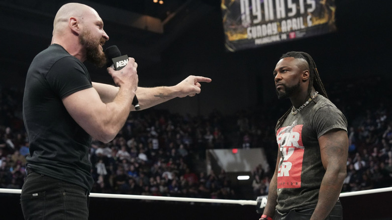 Moxley and Strickland confronting one another in the ring