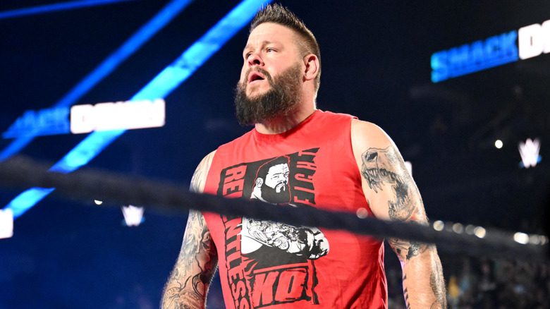 Kevin Owens wearing a red shirt on WWE SmackDown