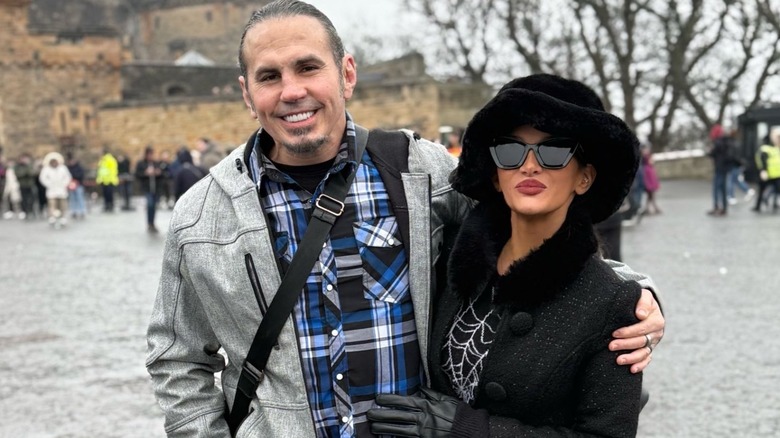 Matt and Reby Hardy pose smiling for the camera in a vacation snap posted to Matt's X page.