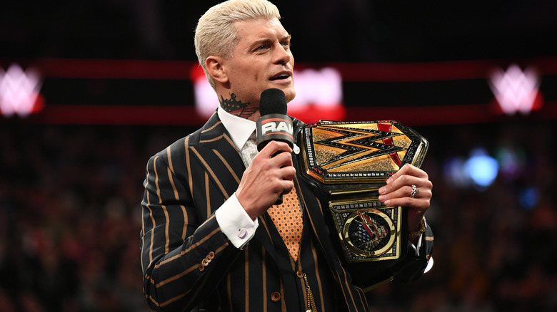 Cody Rhodes in the ring with his title