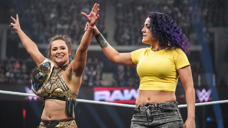 Lyra Valkyria and Bayley in the ring
