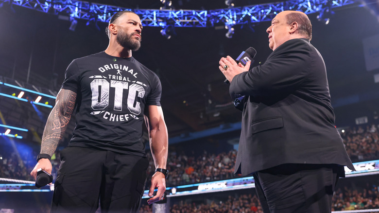 Roman Reigns and Paul Heyman in the ring