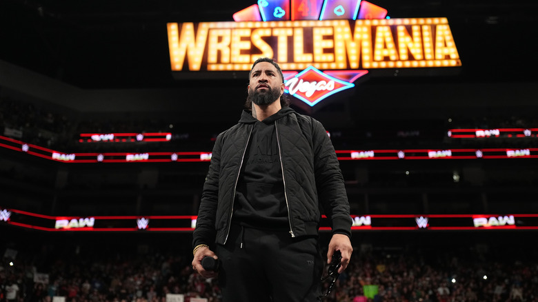 Jey Uso standing in front of the sign for WWE WrestleMania 41