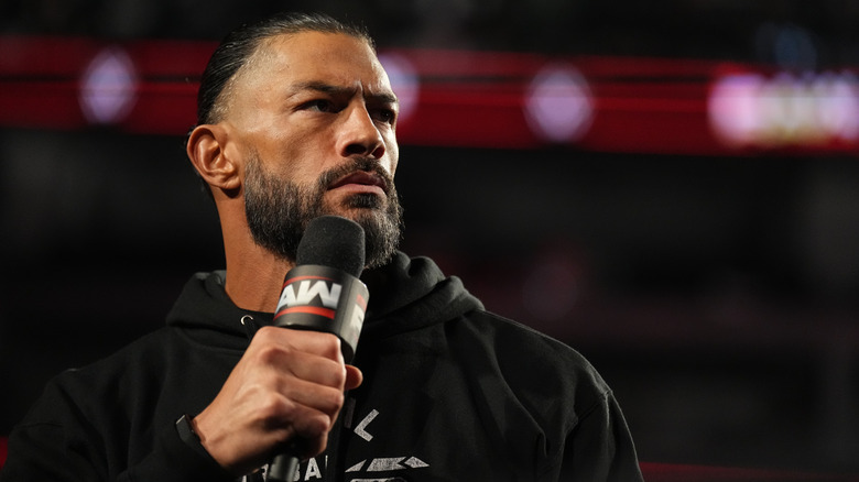 Roman Reigns cuts a promo in the ring