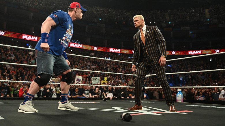 Gloves off, John Cena and Cody Rhodes prepare to throwdown during an in-ring confrontation before WrestleMania 41