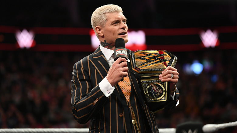 Rhodes in the ring with his Undisputed WWE Championship