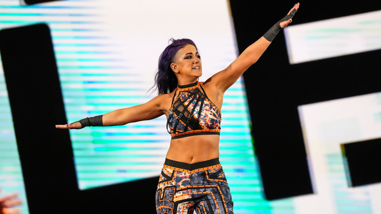 Bayley soars down the entrance ramp making her way to the ring