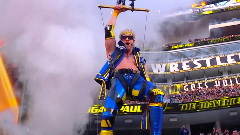 Logan Paul ziplines down to the ring during his WrestleMania 39 entrance.