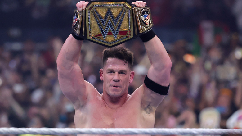 John Cena holds up WWE title at WrestleMania 41