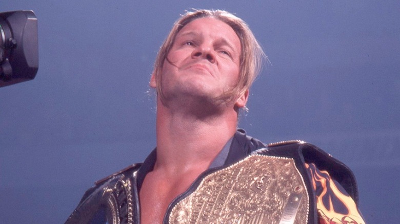Chris Jericho looking smug in front of a video camera