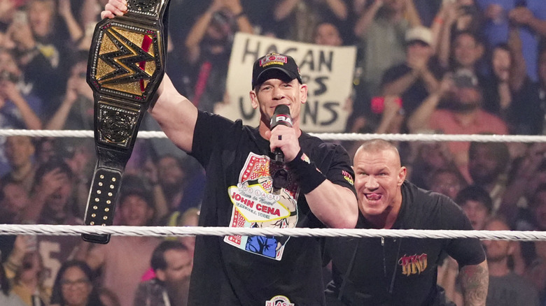 Randy Orton (R) watches John Cena in the ring during Monday Night Raw at T-Mobile Arena on April 21, 2025 in Las Vegas, Nevada.