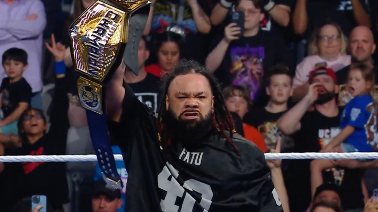 Jacob Fatu holds up WWE United States championship belt on SmackDown