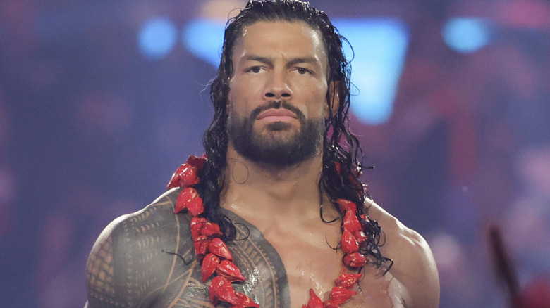 Roman Reigns wearing the Ula Fala around his neck
