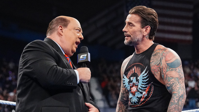 Paul Heyman and CM Punk on 