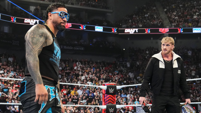 Jey Uso and Logan Paul face-off at T-Mobile Center on April 29, 2024 in Kansas City, Missouri.