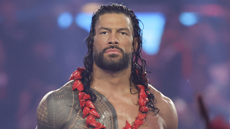 Roman Reigns wearing the red Samoan ula fala necklace