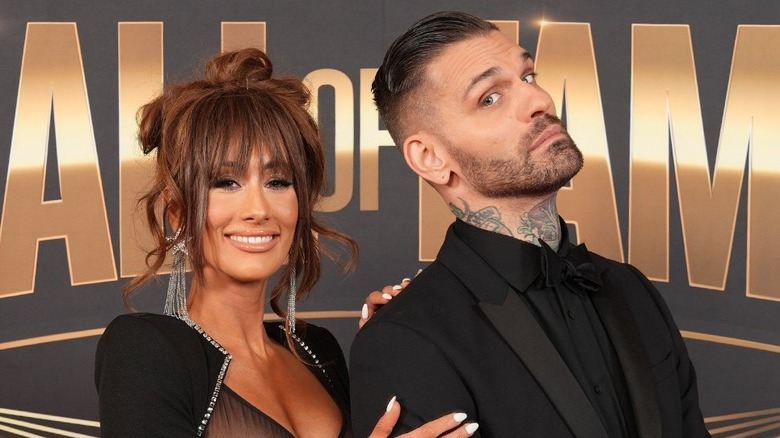Carmella (Leah Van Dale) and Corey Graves at a WWE event