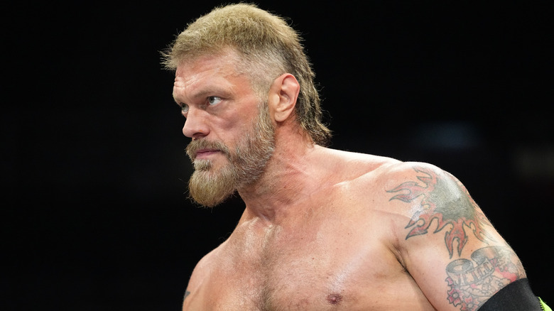 Adam Copeland stands in the ring before his match with Claudio Castagnoli on an episode of 
