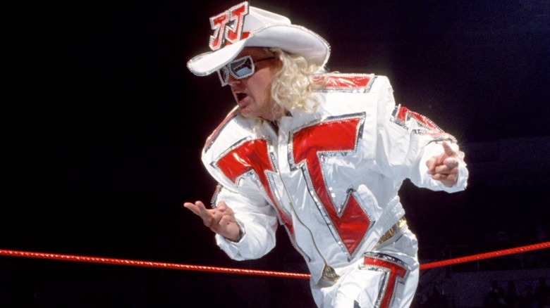 Jeff Jarrett dances and poses in the ring before a match in the then-WWF.