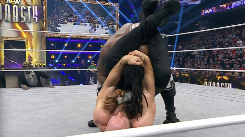 Moxley with a Triangle locked in on Strickland