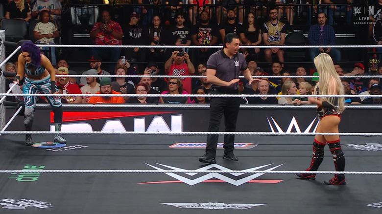 Bayley and Morgan staring each other down in the ring